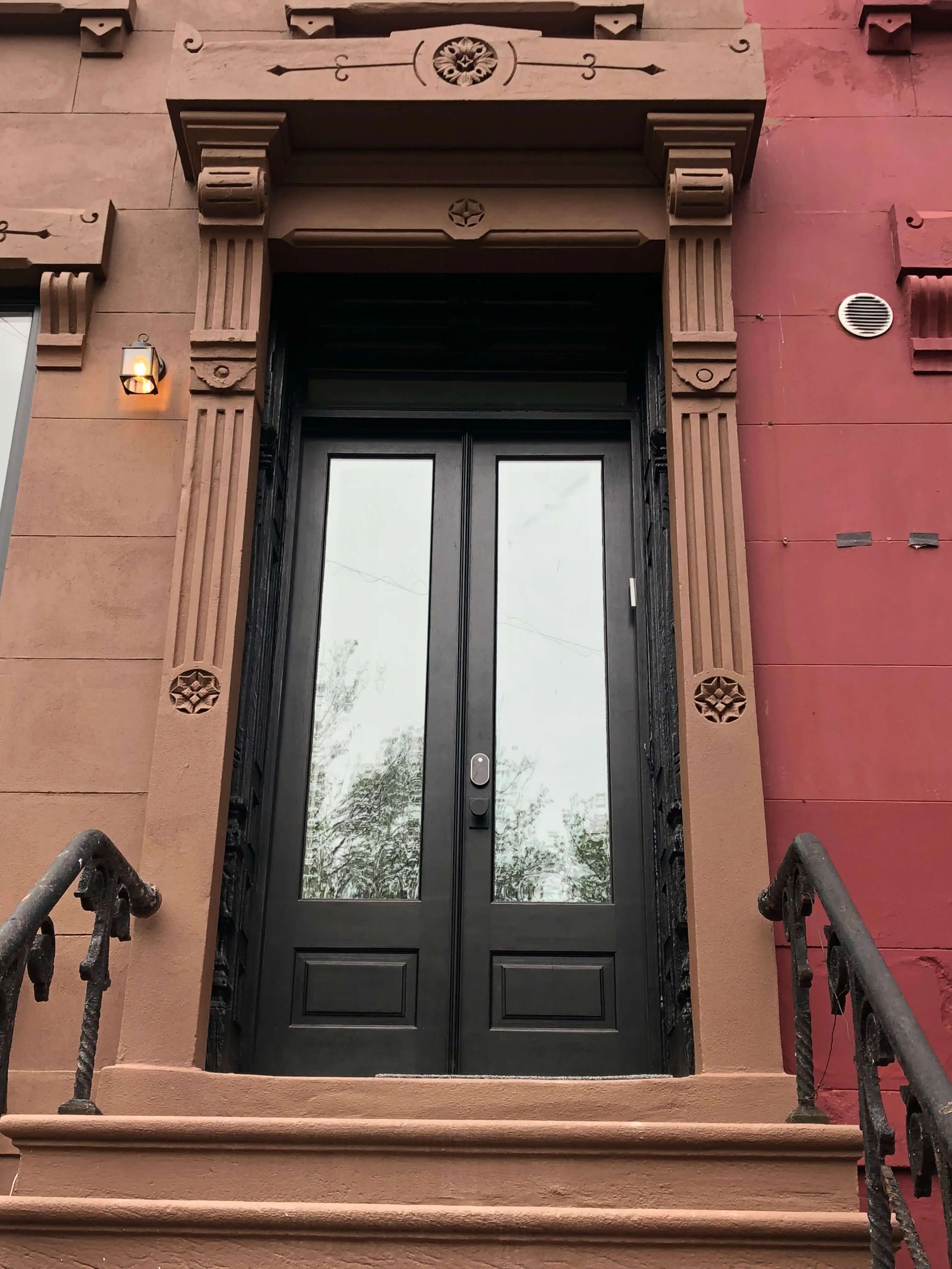 A warm, inviting brownstone door
